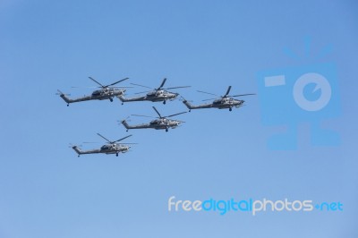 Mi-28n (havoc) Attack Helicopters Of Aerobatic Team Berkuty Fly Stock Photo