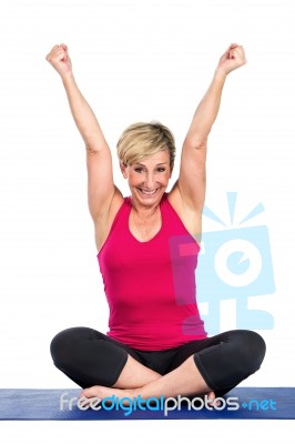 Middle Age Woman With Arms Raised Stock Photo