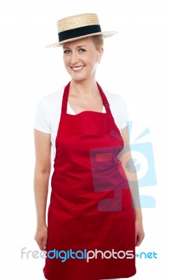 Middle Aged Cook Wearing Hat Stock Photo