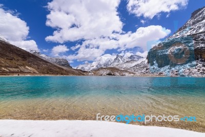 Milk Lake On Top,green And Blue With Snow Beach On The Top Of Sn… Stock Photo