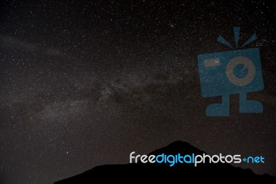 Milky Way Galaxy With Stars And Space Dust In The Universe, Long Exposure Photograph. With Grain Stock Photo