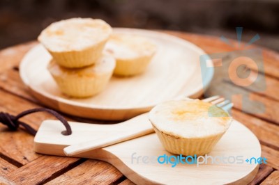 Mini Pies On Wooden Plate Stock Photo
