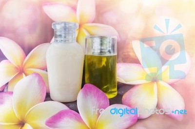 Mini Set Of Bubble Bath And Shower Gel Liquid With Pink Flowers Stock Photo
