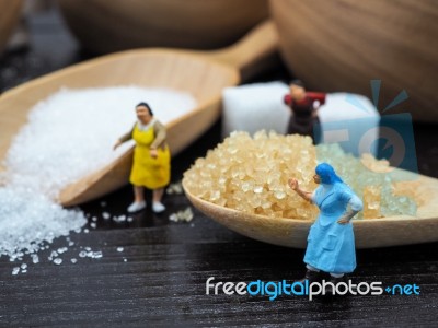 Miniature Fat Woman Standing Near Wooden Bowl And Spoon With Sug… Stock Photo