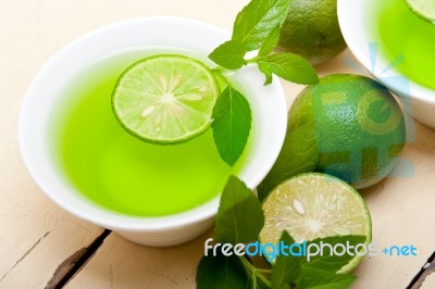 Mint Infusion Tea Tisane With Lime Stock Photo Mint Infusion Tea Tisane With Lime Stock Photo