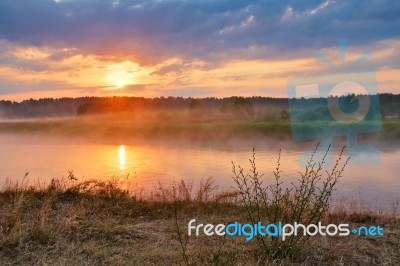 Misty Summer Sunrise. Foggy River In The Morning. Misty Morning Stock Photo