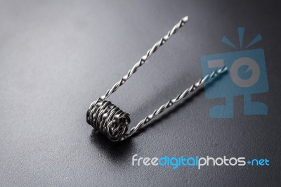 Mix Twisted Coil For Vaping On A Black Background Stock Photo
