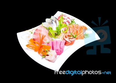 Mixed Sashimi In White Plate Isolated On Black Background,with C… Stock Photo