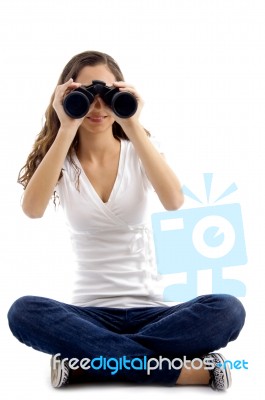Model Looking Through Binocular Stock Photo