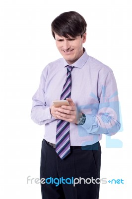 Modern Businessman Using Mobile Phone Stock Photo