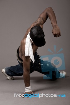 Modern Man Doing Single Handed Steps Stock Photo