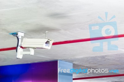 Modern Security Camera On The Indoor Concrete Wall Stock Photo