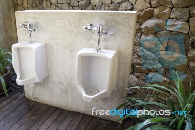 Modern Urinal Stock Photo