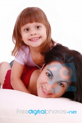 Mom And Her Baby Girl Lying On Bed Stock Photo Mom And Her Baby Girl Lying On Bed Stock Photo