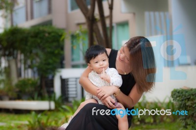 Mom And Son Enjoying The Happy Time Stock Photo