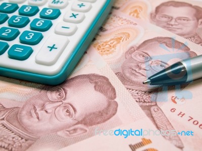 Money And Calculator Stock Photo