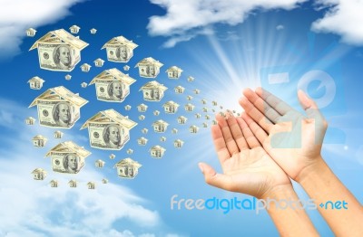 Money House In Hand Stock Photo