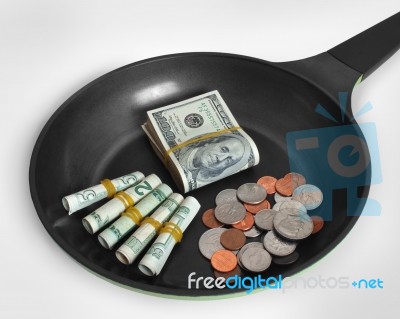 Money In A Pan Stock Photo