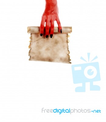 Monster Hand Holding A Folded Roll Of Old Paper (letter Or Invit… Stock Photo