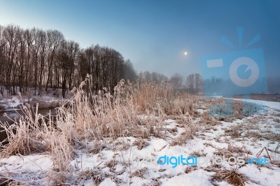 Moonlight In The Winter Dawn. Fog And Mist On Snowy Winter River… Stock Photo