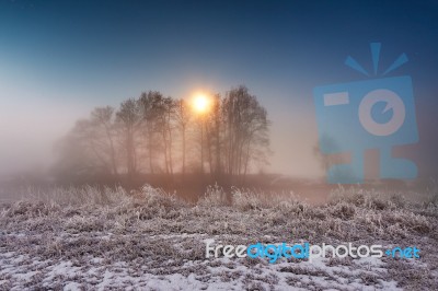 Moonlight In The Winter Night. Fog And Mist On Snowy Winter Rive… Stock Photo