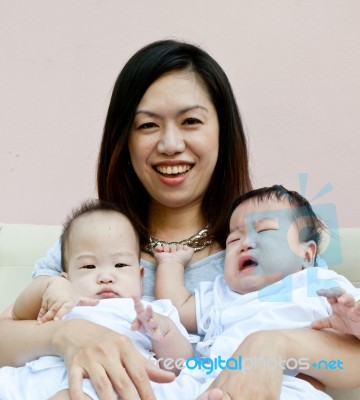 Mother And Babies Stock Photo