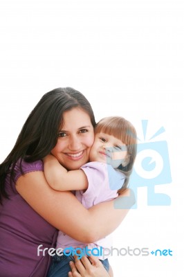 Mother And Her Smiling Daughter Stock Photo
