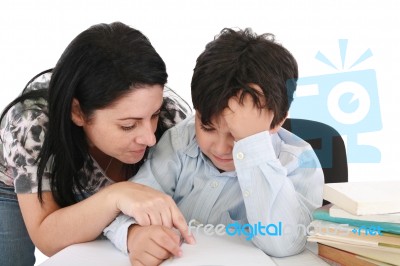 Mother Helping With Homework Stock Photo