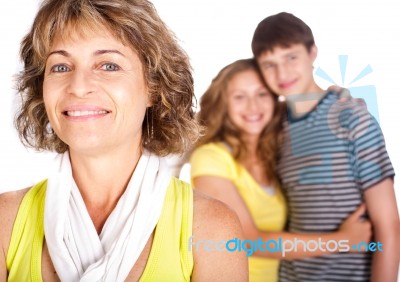 Mother Hugs Her Son Stock Photo
