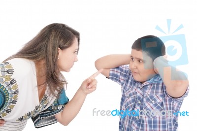 Mother Scolding Her Son Stock Photo