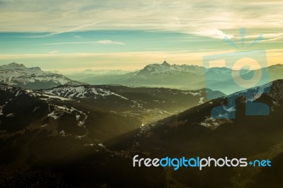 Mountain Scene With Sun Light Casting Shadows Stock Photo