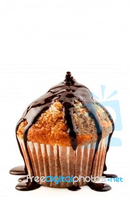 Muffin With Liquid Chocolate Stock Photo