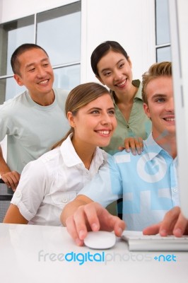 Multi Ethnic Group Of People Looking Computer Stock Photo Multi Ethnic Group Of People Looking Computer Stock Photo