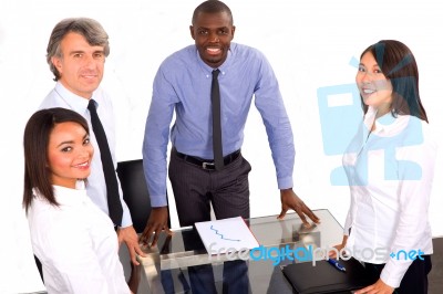 Multi Ethnic Team During Meeting Stock Photo