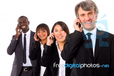 Multi Ethnic Team With Mobile Stock Photo