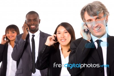 Multi-ethnic Team With Mobile Stock Photo