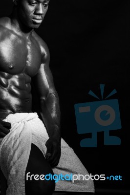 Muscular Male Model Wrapped In A Towel Stock Photo