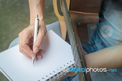 Music Composer Hand Writing Songs Stock Photo