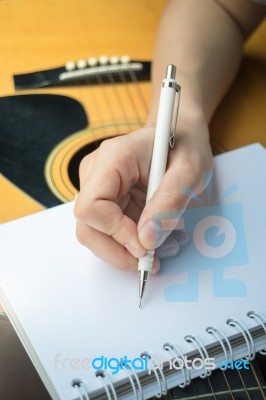 Music Composer Hand Writing Songs Stock Photo