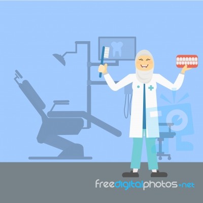 Muslim Dentist Holding A Teeth Model And Toothbrush Stock Image