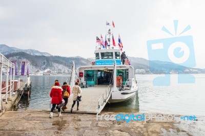 Nami Island - South Korea - January 19: Tourists Arrived In Nami Island By A Ferry On January 19, 2015 In Nami Island, South Korea Stock Photo