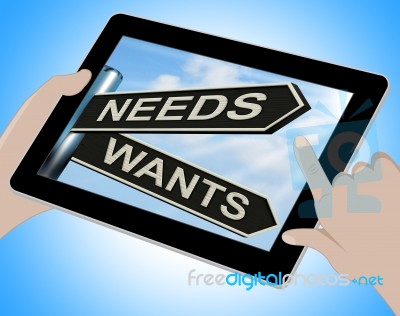 Needs Wants Tablet Means Necessity And Desire Stock Image
