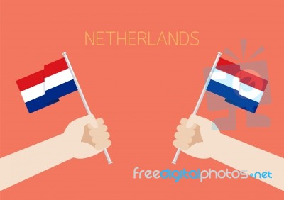 Netherlands National Day With Hands Holding Up Netherlands Flags… Stock Image