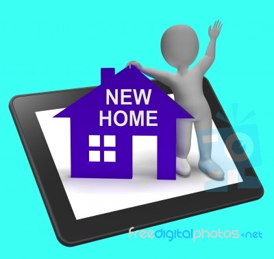 New Home House Tablet Shows Buying Property And Moving In Stock Image