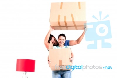 Newly Weds Moving Into New Home Stock Photo