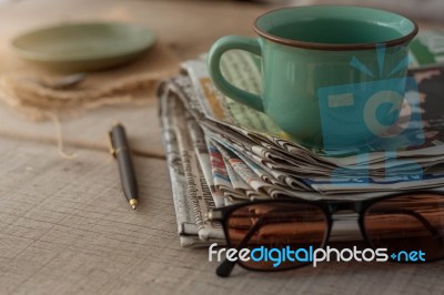 Newspapers On Wooden Floor Stock Photo