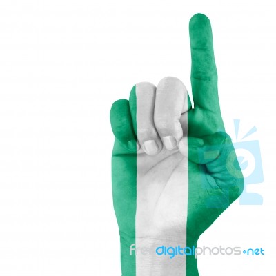 Nigeria Flag On Pointing Up Hand Stock Photo