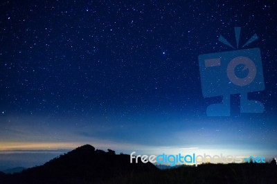 Night Sky With Star On Top Of Mountain Stock Photo Night Sky With Star On Top Of Mountain Stock Photo