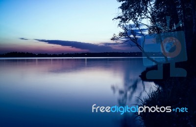 Night Swallowing Smooth Of River Stock Photo