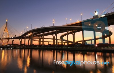Night View Of Bhumibol Bridge In Thailand, Also Known As The Industrial Ring Road Bridge Stock Photo